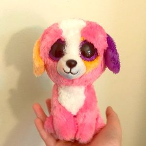Stuffed rainbow dog